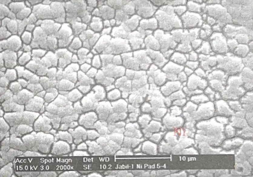 Obvious corrosion on the surface of the pad nickel plating was observed using SEM